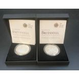 The 2010 and 2011 Royal Mint One Ounce Silver Proof Britannia, Boxed.