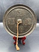 An antique Chinese bronze mirror (Approx. Dia13cm)