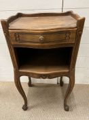 A bedside cabinet, French in style (H74cm W38cm D30cm)