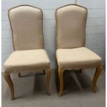 A Pair of French linen side chairs