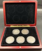 A Boxed set of Five Silver Crown Coins: George III 1819, 1821 and Queen Victoria 1845, 1889 and