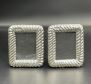 A Pair of miniature silver photo frames (Approx 8cm x 7cm)