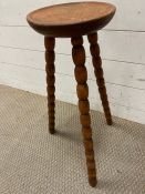 A bobbin leg tripod stool/table
