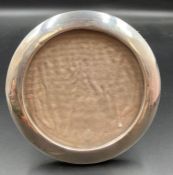 A Hallmarked round silver photo frame.