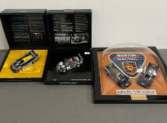 A Rare framed Martini racing diecast model test cars. Porsche 936 "Art and Bull" along with two