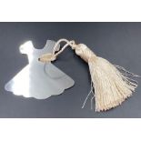 A White metal dress bookmark with silk tassel