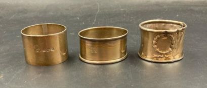 Three silver napkin rings, various hallmarks and makers (Total Approximate Weight 70g)