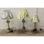 Three hand painted wooden lamp, signed to base and shade