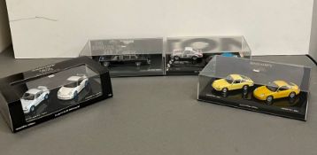 Four boxed Minichamp display diecast cars