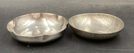 Two Keswick School of Industrial Art hammered metal pin dishes.