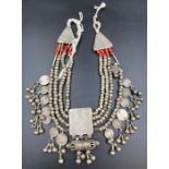 A white metal Omani necklace