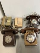 Five vintage dial and press dial telephones