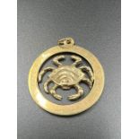 A 9ct gold Cancer pendant (Approximate Weight 2.3g)