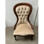 A Victorian style nursing chair with button back