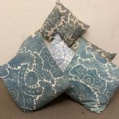 A selection of six scatter cushions in blue and white