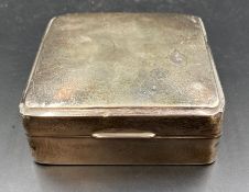 A hallmarked silver cigarette box, hallmarked for Birmingham