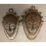 Two bronze Antique African masks (H30cm and H20cm)