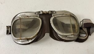 A pair of vintage Halcyon driving goggle