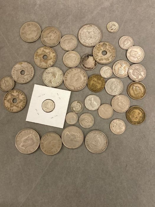 A quantity of British Colonial coins, Africa, Australasia, etc some silver