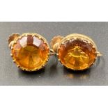 A Pair of 9ct gold earrings with citrine style stones.