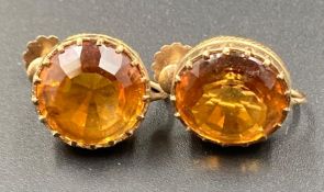A Pair of 9ct gold earrings with citrine style stones.