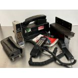 A selection of histrionic mobile phones, BT and Nec, etc