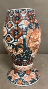 An antique Imari vase (31cm H)