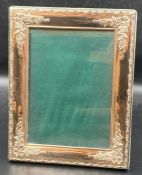 A silver picture frame, hallmarked for Sheffield 23cm x 18cm