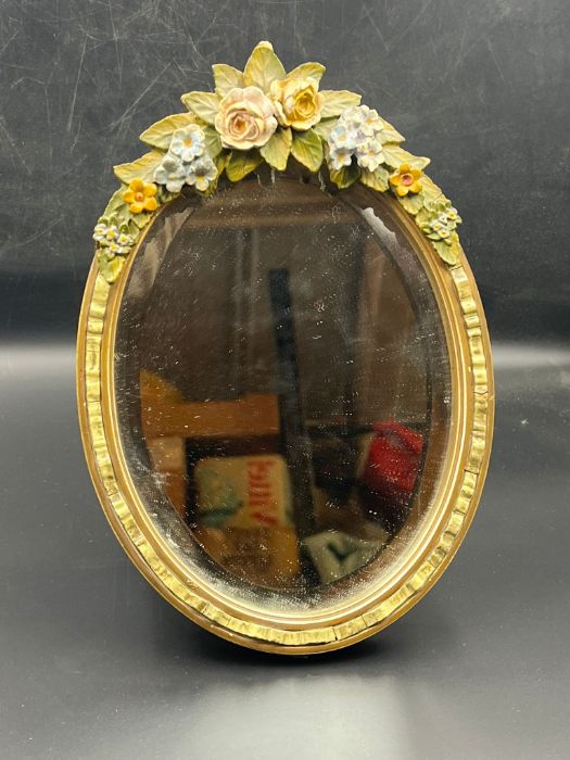 Small oval mirror