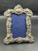 A silver repousse frame, Birmingham 1904