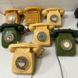 Seven dial and push button telephones