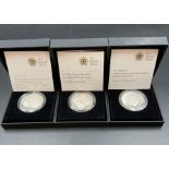 Three Royal Mint silver proof coins: 2008 UK Queen Elizabeth 1 £5, 2010 Restoration of the