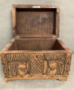 A small hardwood carved wooden chest