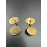 A Pair of 9ct gold gents cuff links (7.7g Approximate Total Weight)