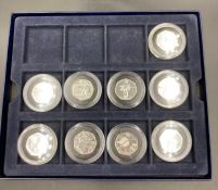 A selection of nine Olympic themed 50p coins from 2011
