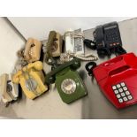 A selection of eight vintage phones