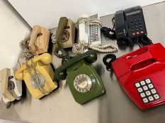 A selection of eight vintage phones