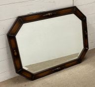 An Octagonal oak framed mirror with beading details 35.5cm x 25.5cm