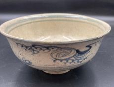 An antique Chinese white and blue bowl