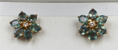 A Pair of 9ct gold aquamarine style earrings