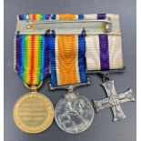 A WWI Military miniature set of Military Cross and Bar, British War, and Victory Medal