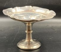A Birmingham hallmarked silver single footed bowl AF.