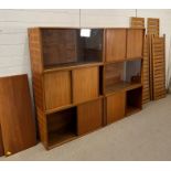 1960's Teak Ladderax storage modular system, six uprights, four cupboards with teak doors, two