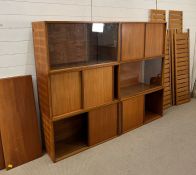 1960's Teak Ladderax storage modular system, six uprights, four cupboards with teak doors, two