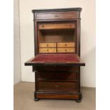 A Queen Anne escritoire. Drawer fronted opening to reveal fall front and fitted interior on