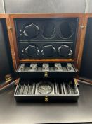 A walnut style watch winder box