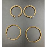 Two pairs of 9ct gold hoop earrings (Approximate Weight 7.7g)