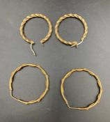 Two pairs of 9ct gold hoop earrings (Approximate Weight 7.7g)