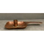 Early Newlyn copper candlestick