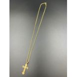 A 9ct gold cross and necklace (Approximate Total Weight 3.9g)